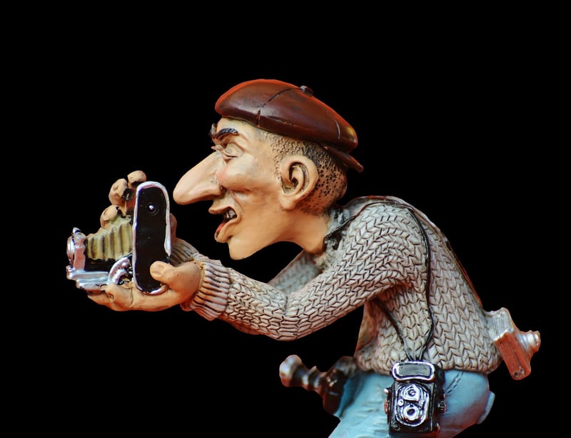 Paparazzi taking a photo of a celebrity